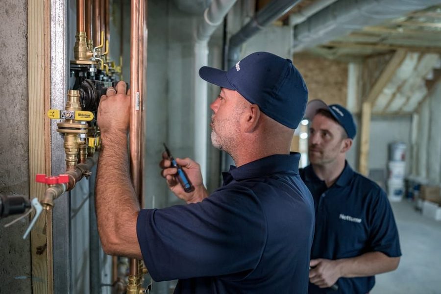 Notturno technician repairing home plumbing