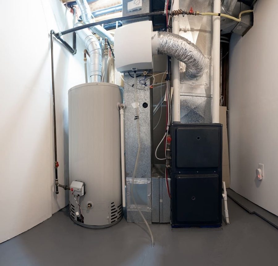 Boiler and furnace system in the basement of a home